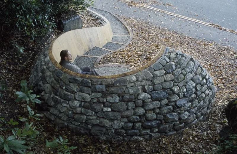 ‘Harlech Bench’, Welsh oak, mixed local field stone. Approx size: 4 x 5 x 3 metres. Harlech, Snowdonia National Park, Wales, UK. 2003.