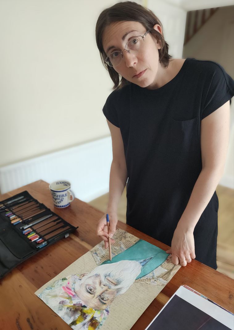 Artist Natalie working on a visionary portrait of Maimonides, using pencils, water pencils, and collage. 2024.