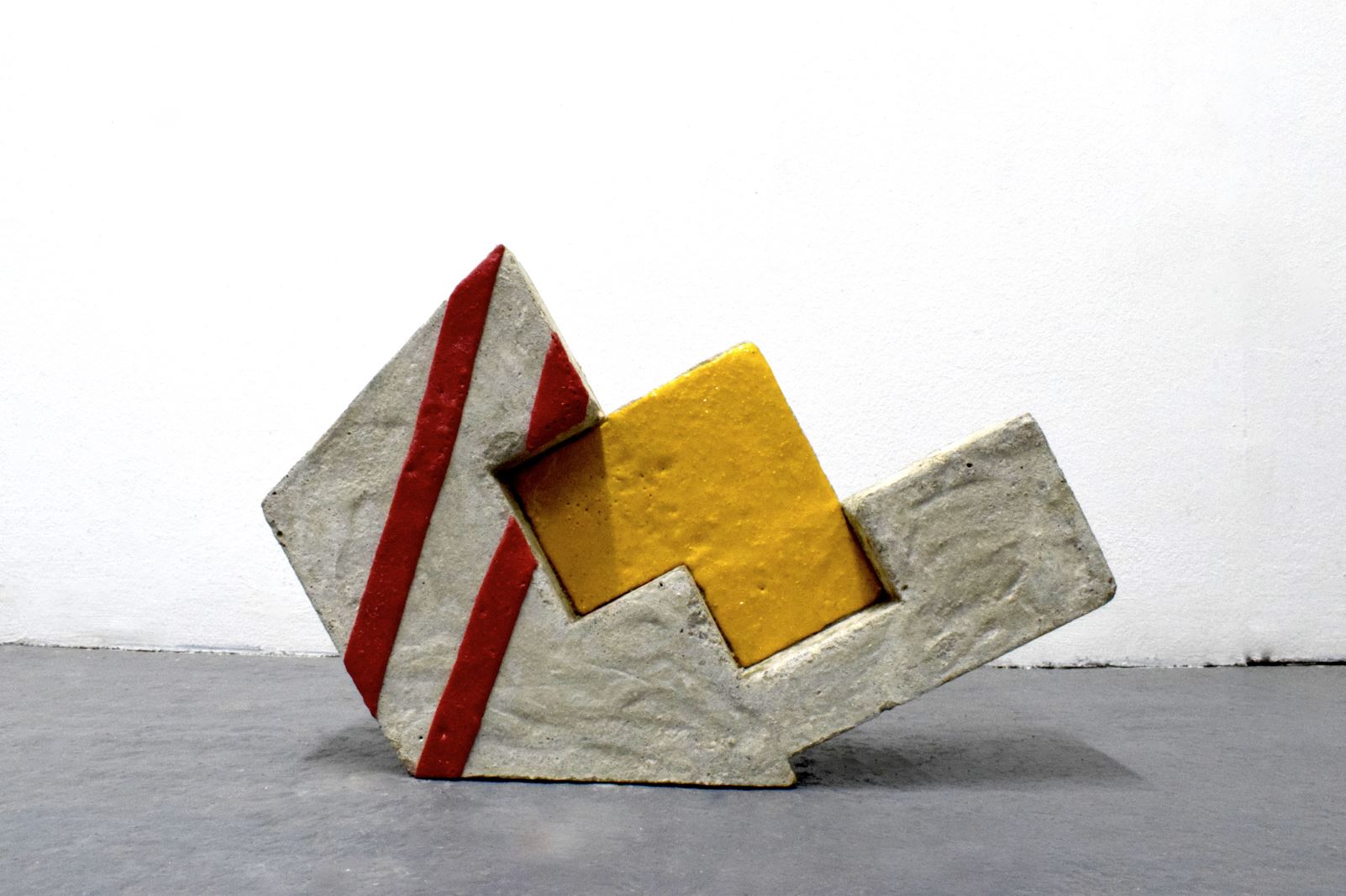 ‘Urban Code’, sculpture by Rabia Raja. Concrete and thermoplastic tape. 33cm x 28cm x 8cm. 2024.