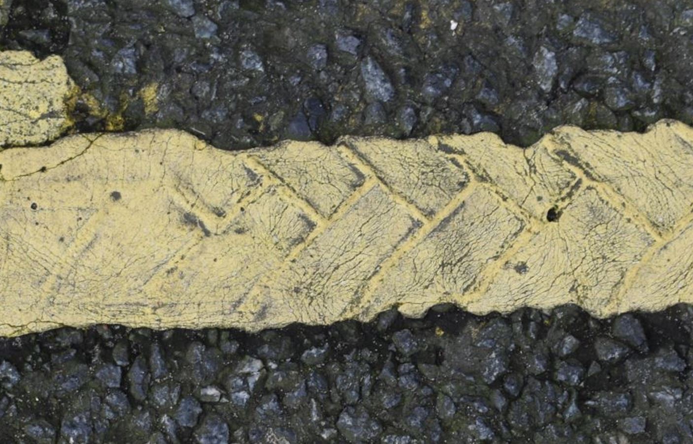 Tire mark left on a road’s marking. Photo by Rabia Raja. Southampton. 2024.